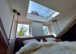 Slaapkamer met dakkapel en Velux dakraam